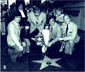 Robert, Richard and families at their induction at the Hollywood Walk of Fame across from Mann's Chinese Theatre (1976)